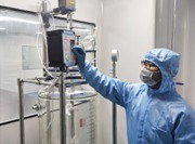 Technician in the GMP cleanroom